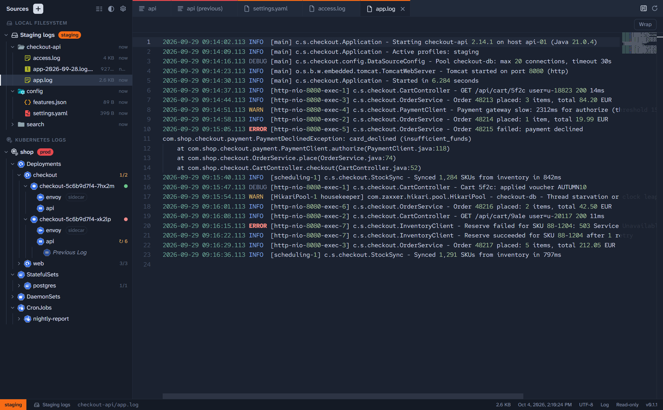 A local folder of logs, with app.log open among several tabs